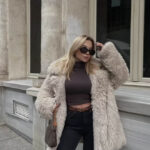 Chic Fluffy Plush Jacket made from soft, high-quality plush fabric, offering a cozy and stylish fit for all occasions.