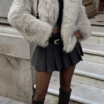 Faux Fur Cropped Jacket with a chic short silhouette, offering warmth and elegance in a stylish design.